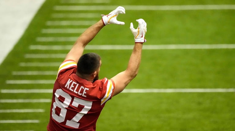 Kansas City Chiefs tight end Travis Kelce stretches during the...