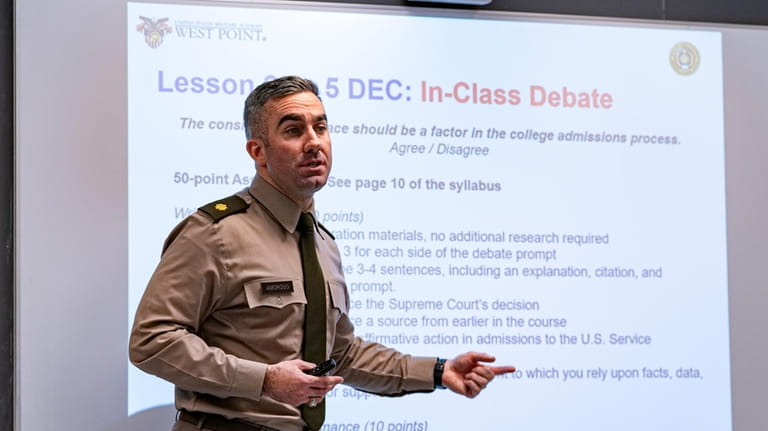 Maj. Joe Amoroso instructs cadets during a class on American...
