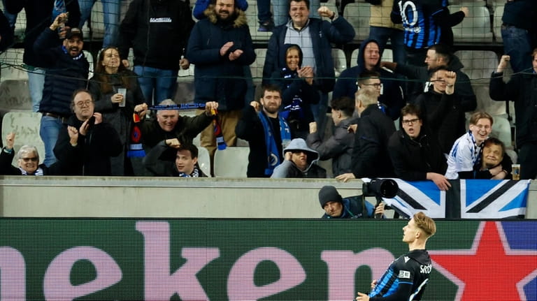Brugge's Michal Skoras celebrates after scoring his sides third goal...