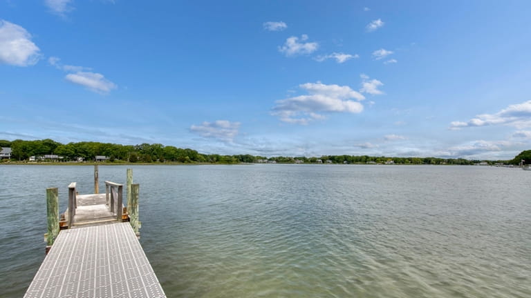 This three-bedroom property in Southold is on the water.