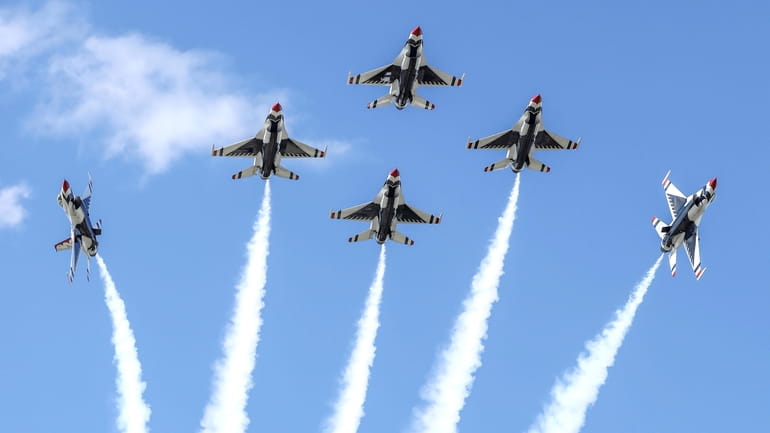 The U.S. Air Force's Thunderbirds fly practice routines at Jones...