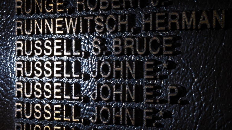 John E. Russell's name on a monument at the Baldwin Veterans...