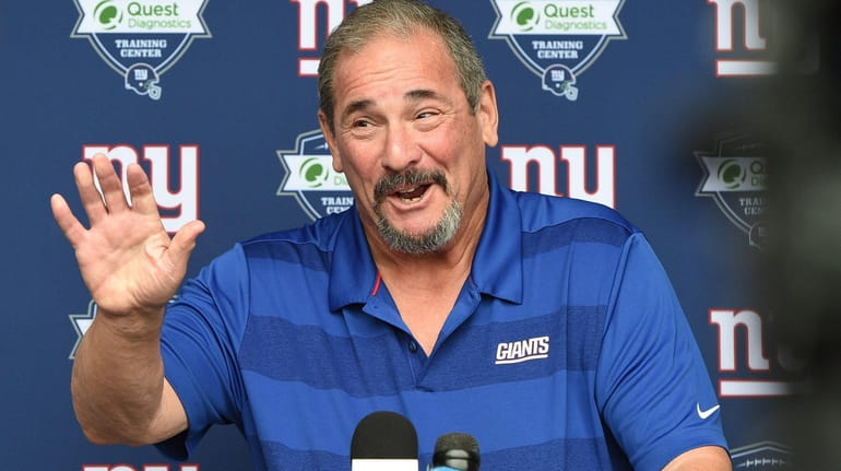 New York Giants general manager Dave Gettleman speaks to the...