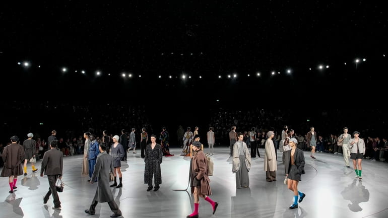 Models wear creations for Dior as part of the Menswear...