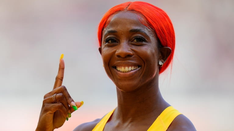 Shelly-Ann Fraser-Pryce gestures after winning a women's 100-meters heat during...