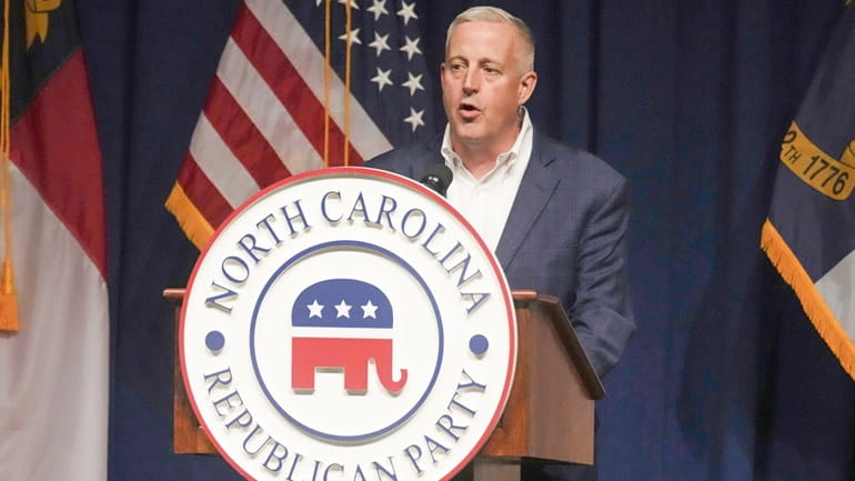 North Carolina GOP Chairman Michael Whatley speaks at the state...