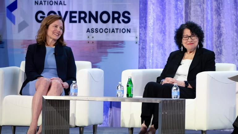 Supreme Court Justices Amy Coney Barrett, left, and Sonia Sotomayor...
