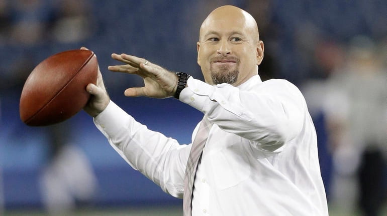 Trent Dilfer plays catch on the field before an NFL...