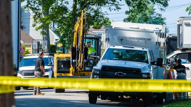 Suffolk County police did not elaborate on the reasons for bringing excavating equipment...