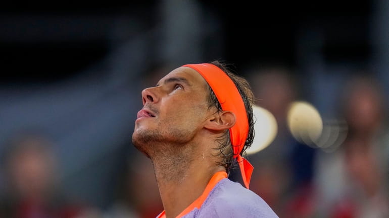 Rafael Nadal, of Spain, reacts during a match against Jiri...