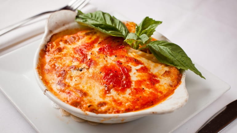 Deftly seasoned ricotta impastata highlights the lasagna at Eric's Italian...