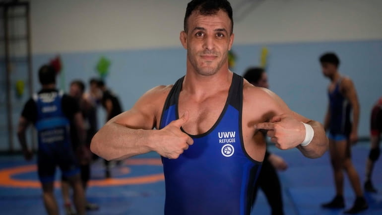 Iranian wrestler Iman Mahdavi, 28, a member of the Refugee...