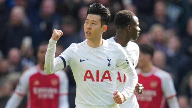 Tottenham's Son Heung-min celebrates after scoring his side's second goal...