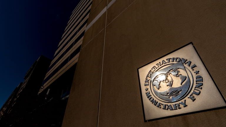 The International Monetary Fund building, Monday, April 5, 2021, in...