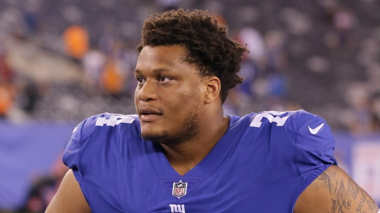 Giants offensive tackle Ereck Flowers looks on following the preseason...