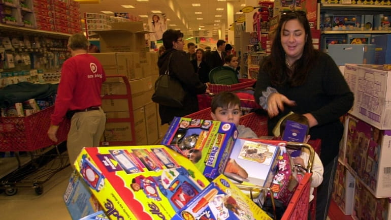 Joy Famiglietti of Bayville, shown shopping at Target her sons,...