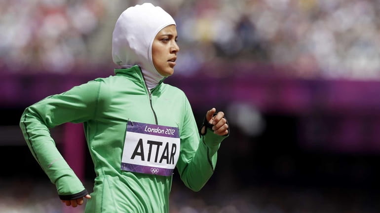 Saudi Arabia's Sarah Attar competes in a women's 800-meter heat...
