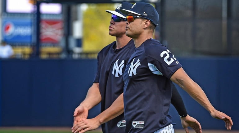 Aaron Judge, left, and Giancarlo Stanton at Yankees spring training...