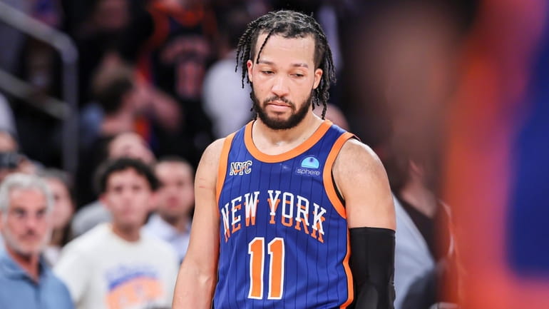 The Knicks' Jalen Brunson reacts in the final seconds in overtime...