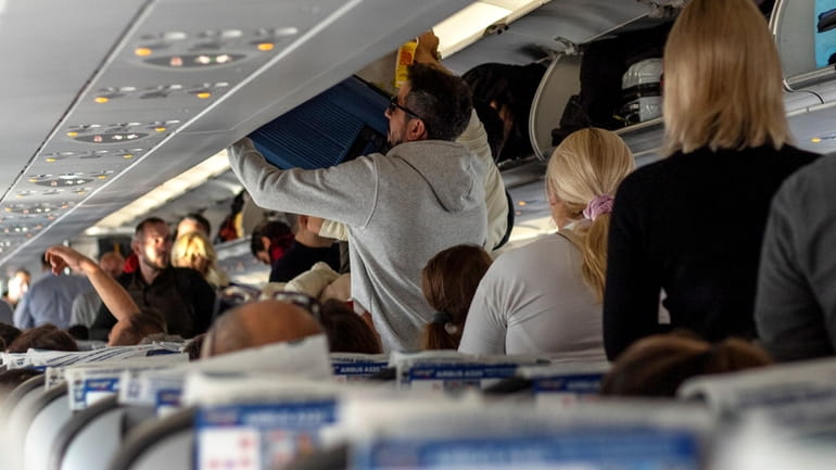 Etiquette coaches say passengers should wait for the rows in...