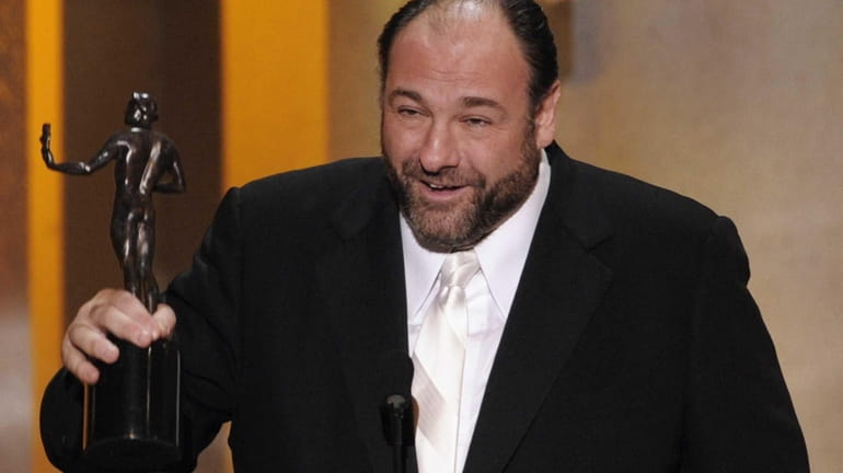 James Gandolfini accepting the award for outstanding performance by a...