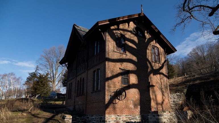 The ornate Gothic Revival mill in Roslyn Harbor was built...