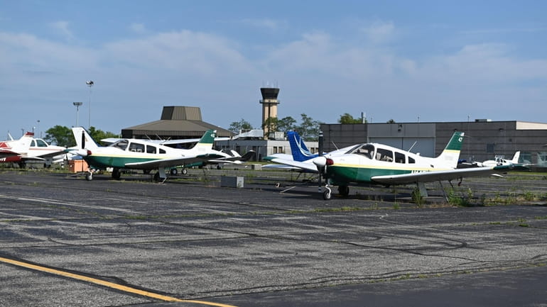 Three Piper Arrow training aircraft at Farmingdale State College Aviation...