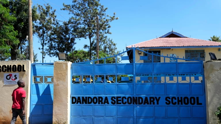 A student enters the Dandora Secondary school in the capital...