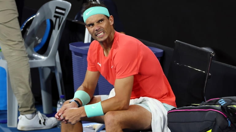 Rafael Nadal withdrew from the Australian Open with a hip muscle injury.  His comeback is on hold - Newsday