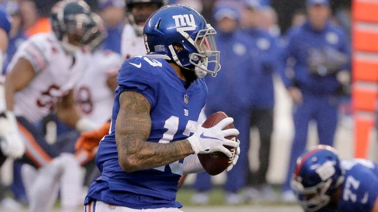 Giants wide receiver Odell Beckham prepares to launch a touchdown...