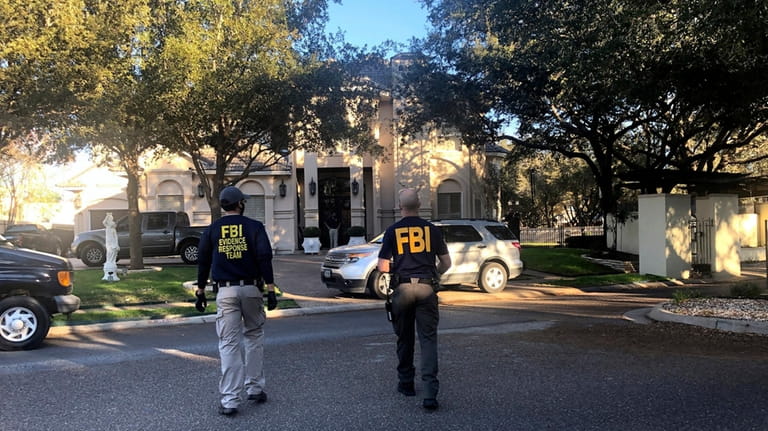 Federal agents search the home of Rep. Henry Cuellar, D-Texas,...