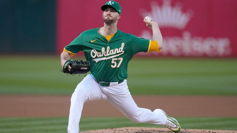 Oakland Athletics pitcher Alex Wood works against the Pittsburgh Pirates...