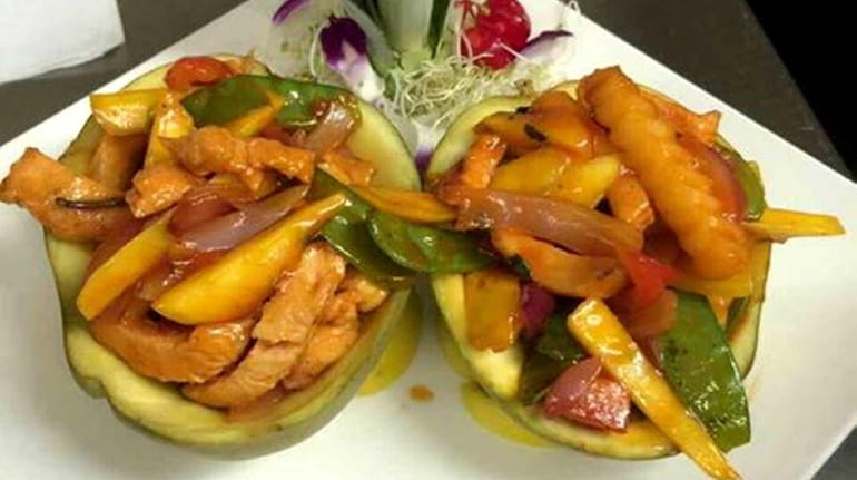 Thai spicy mango chicken is on the menu of the...