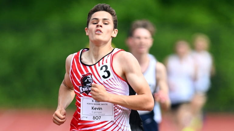 Kevin Cannon, Floral Park, runs in the 3,200 meter event...