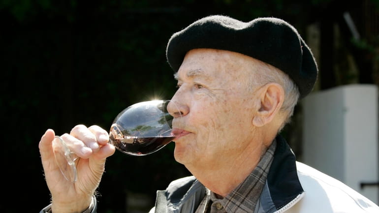 Winemaker Mike Grgich sips a glass of his Cabernet Sauvignon...