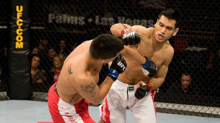 Brooklyn's Phillipe Nover, right, fights Rob Emerson at 155 pounds...