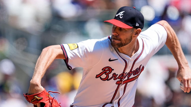 Atlanta Braves starting pitcher Chris Sale delivers in the first...
