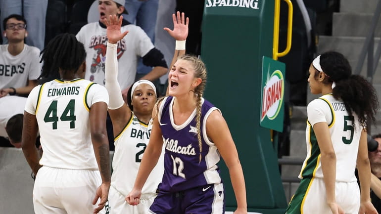 Kansas State guard Gabby Gregory, center right, reacts after being...