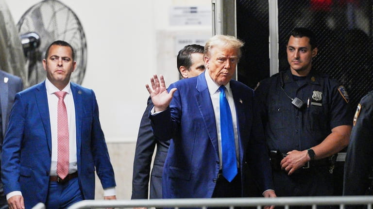 Former President Donald Trump returns to his trial at the...