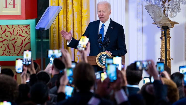 President Joe Biden speaks during a Hanukkah reception in the...