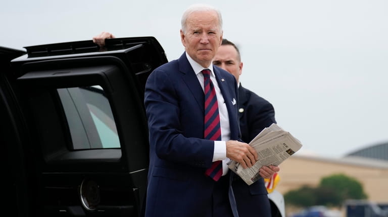 President Joe Biden arrives to board Air Force One at...