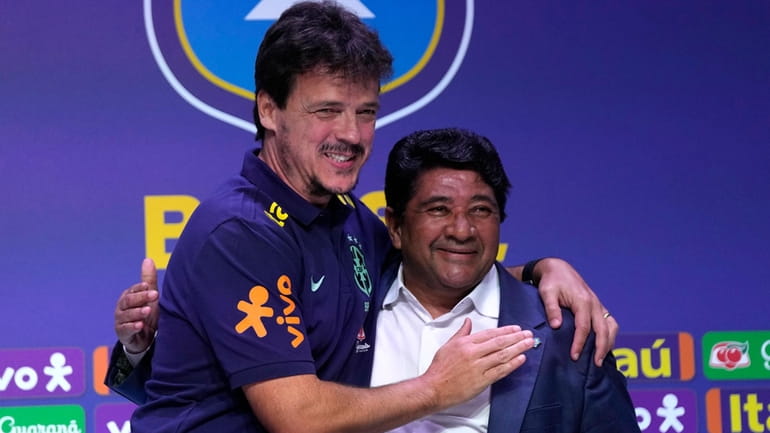 Fernando Diniz, left, the new head coach of the Brazil's...