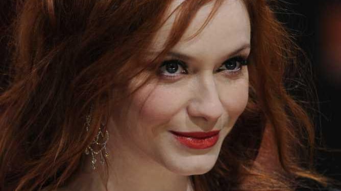 US actress Christina Hendricks poses on the red carpet arriving...