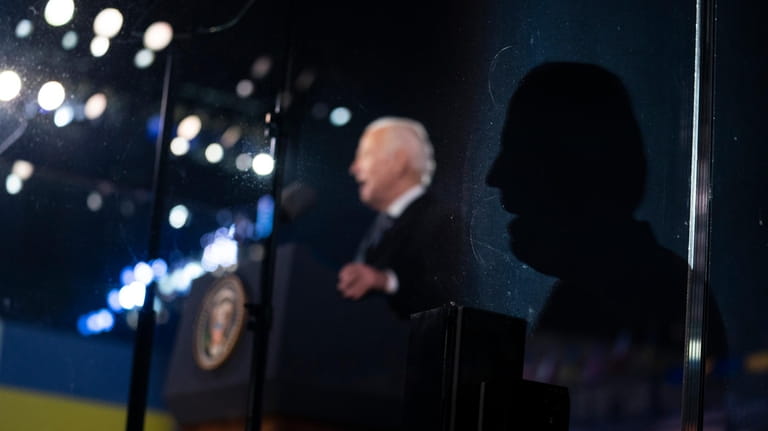 President Joe Biden delivers a speech marking the one-year anniversary...