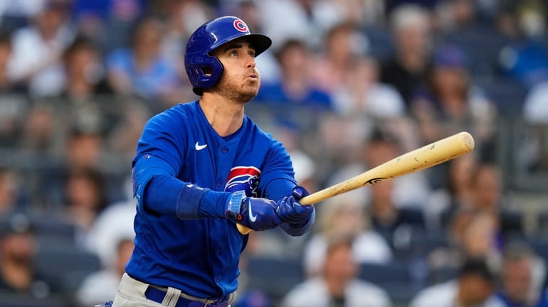 Chicago Cubs' Cody Bellinger watches his home run during the...