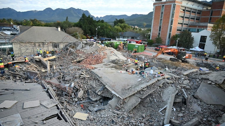 The scene of a collapsed building in George, South Africa,...