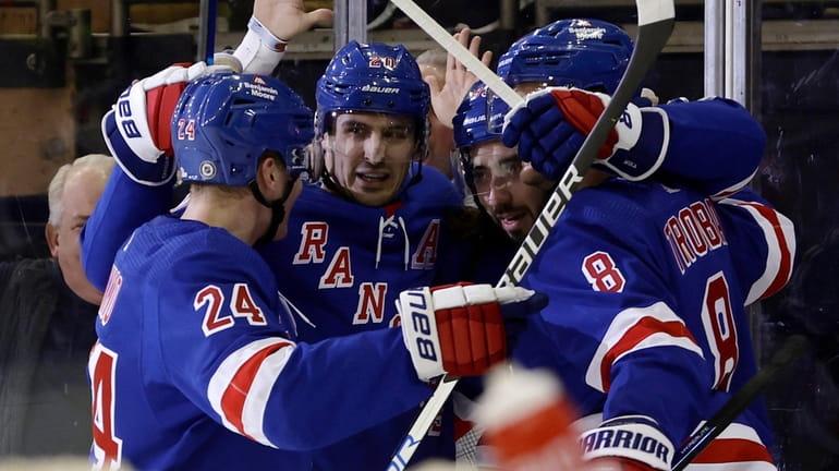 Chris Kreider of the Rangers celebrates his first-period goal against the...