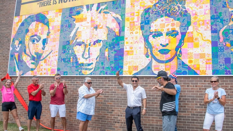 A huge mural depicting four acclaimed artists, created by special...