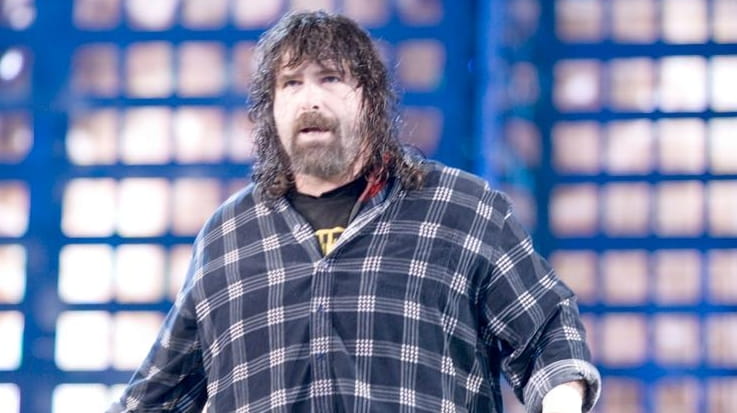 Mick Foley heads to the ring to face Edge in...