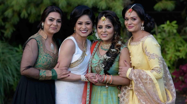 Sisters (left to right) Sonia Mohan, Indu Kaur, Kiran Wadhwa and...